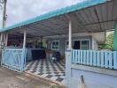 Covered outdoor area with checkered flooring