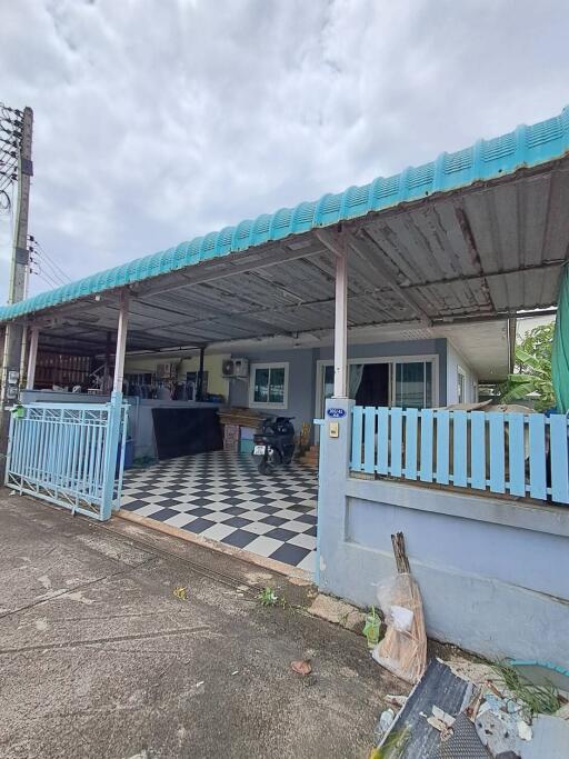 Covered outdoor area with checkered flooring