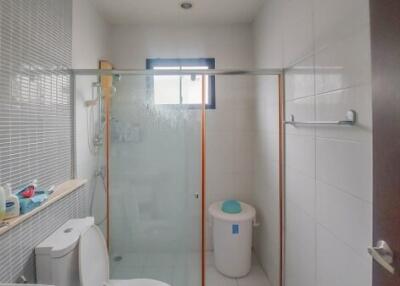 Modern bathroom with shower and toilet