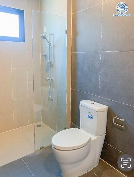 Modern bathroom with shower and toilet