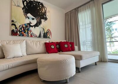 Living room with modern art and white sectional sofa