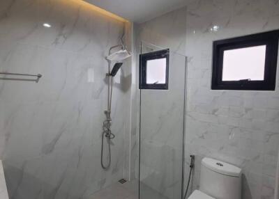 Modern bathroom with shower and toilet