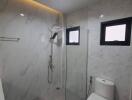 Modern bathroom with shower and toilet