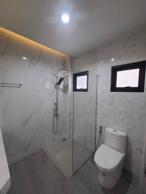 Modern bathroom with shower and toilet