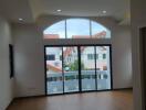 Spacious living room with large windows