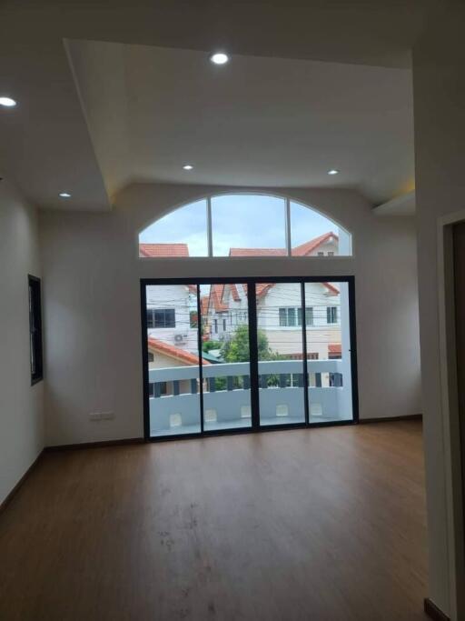 Spacious living room with large windows