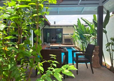 Backyard with pool and seating area