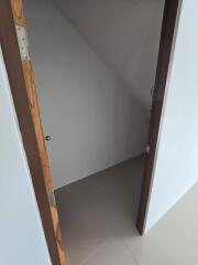 Small storage space under stairs