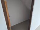 Small storage space under stairs