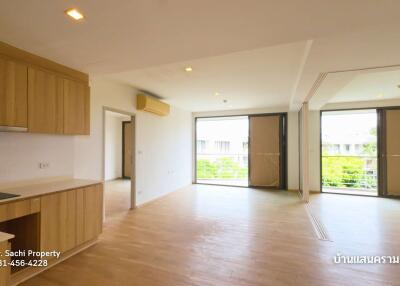 Spacious open-plan living area with kitchen