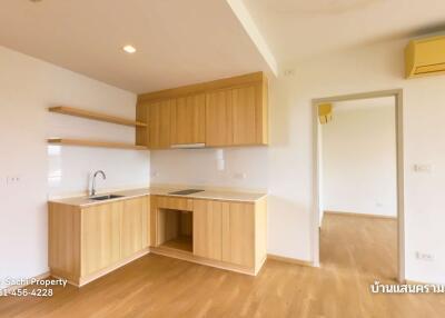 Modern kitchen with wooden cabinets and open shelving