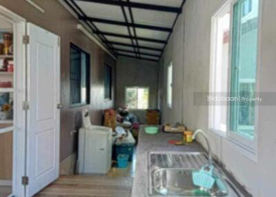 A single-story house with 3 bedrooms and 2 bathrooms, located in the Hang Dong area, near Kad Farang.