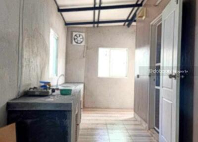 A single-story house with 3 bedrooms and 2 bathrooms, located in the Hang Dong area, near Kad Farang.