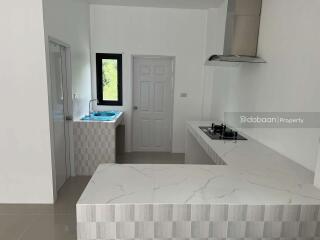 Single-story house with 2 bedrooms and 2 bathrooms, located in San Sai, near Mae Kuang Intersection.