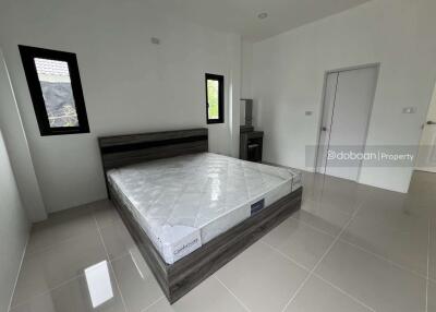 Single-story house with 2 bedrooms and 2 bathrooms, located in San Sai, near Mae Kuang Intersection.