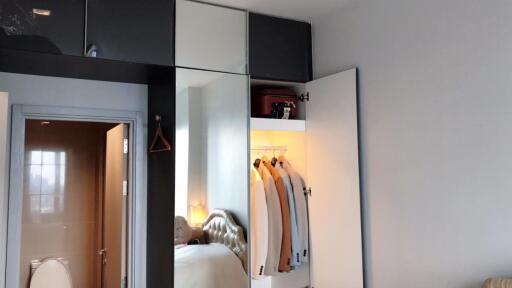 Bedroom with closet and bathroom entrance