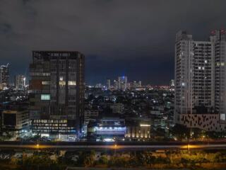 Night cityscape view with modern buildings