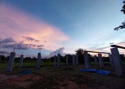 Outdoor construction site at sunset