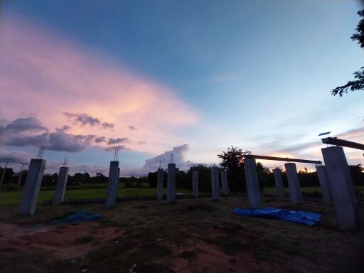 Outdoor construction site at sunset