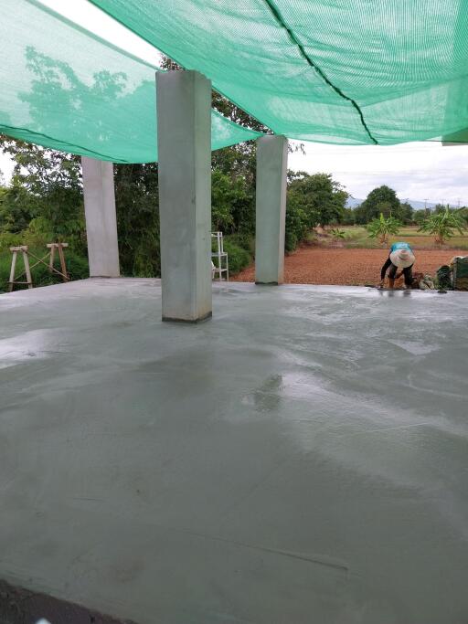 Under construction area with green canopy