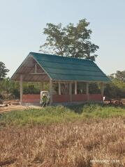 Under-construction building in a field