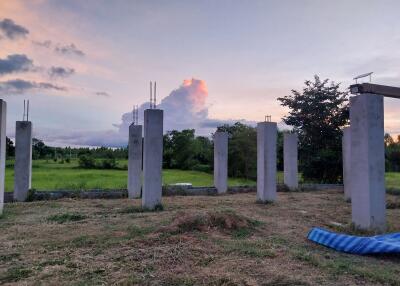 Under construction building with concrete pillars