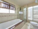 Modern bathroom with tub and shower area