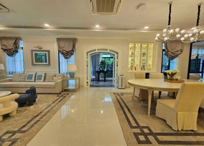 Spacious living and dining area with elegant furnishings