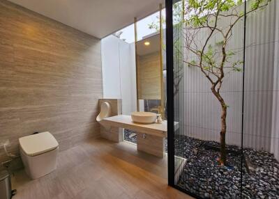 Modern bathroom with garden view