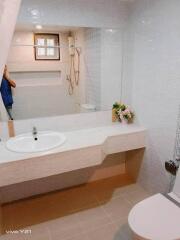 Modern bathroom with large mirror