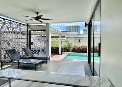 Covered patio with pool view