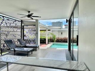 Covered patio with pool view