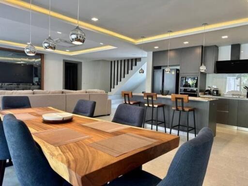 Modern main living area with open plan kitchen and dining table