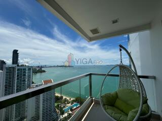 Balcony with panoramic ocean view and hanging chair