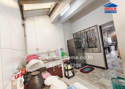 Image of a kitchen with a view into the living space