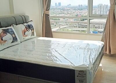 Bedroom with a large window view