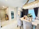 modern dining room with chandelier and elegant furnishings