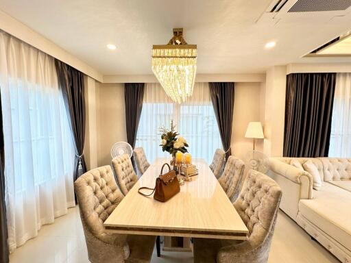 Elegant dining area with chandelier