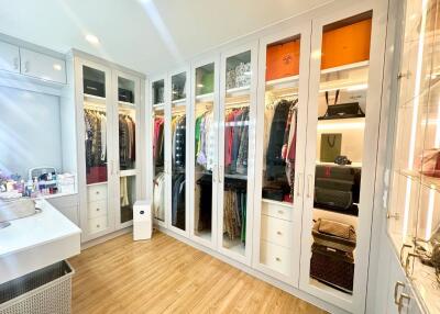 Spacious and organized walk-in closet with ample storage space