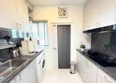 Modern kitchen with sleek design and appliances