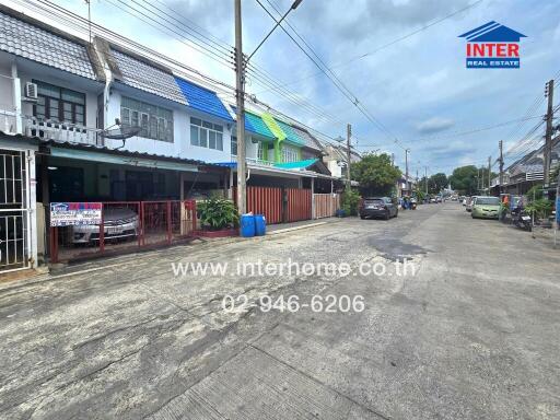 View of residential street with multiple houses