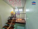 Staircase and landing area with decorative ceiling