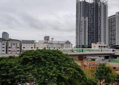 View of nearby buildings and greenery