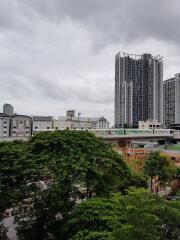 View of nearby buildings and greenery