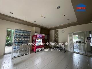 Lobby area with vending machines and water bottles