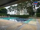 Swimming pool area with lounge chairs