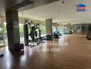 Spacious gym with various workout equipment