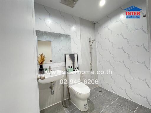 Modern bathroom with shower and toilet