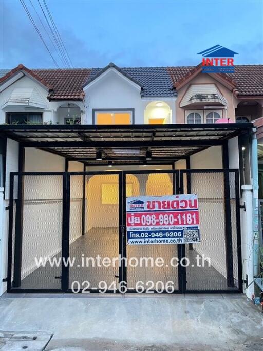 Two-story house exterior with a garage