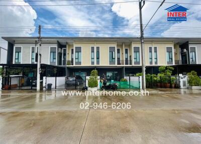 Front view of a modern townhouse complex